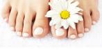 На педикюр с покрытием Vinylux или Shellac в салоне красоты Madyko.